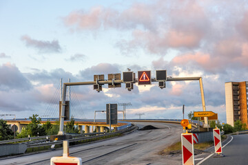 Road repair. Construction equipment. Temporary traffic signs