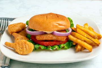 haddock sandwich  with   fries and  breaded shrimp