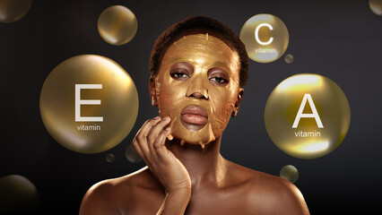 Woman applying gold facial mask in spa setting, emphasizing skincare and beauty routine at evening