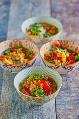 butternut squash soup with tomato and cilantro