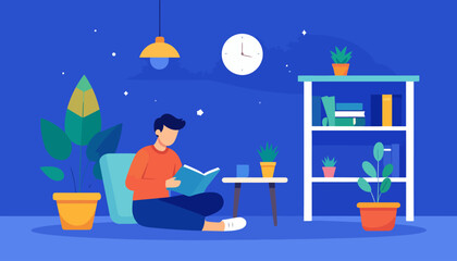 A young man reading a book on the floor at night in a cozy, modern room with plants and a bookshelf.