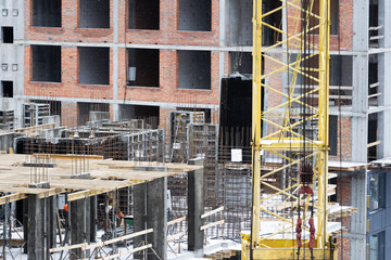 Group of construction engineer team in standard safety uniform work planing in construction site