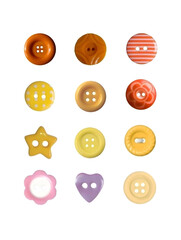 Obraz premium A charming set of buttons in warm tones like orange and brown, featuring various shapes and decorative patterns. Ideal for crafts and textile designs.