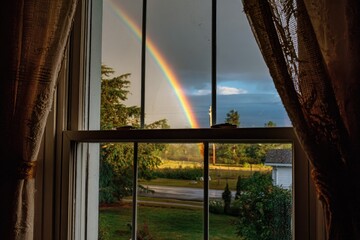 Rainbow viewed through a window