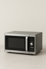 Obraz premium Stainless Steel Microwave on Light Surface