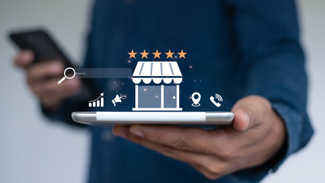 Mobile phone showing online storefront with 5-star rating, local SEO icons and search bar. Ideal for e-commerce, digital marketing, and business reputation concept. - Powered by Adobe