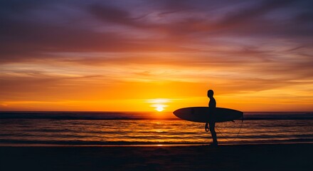 Sunset surfer silhouette on beach