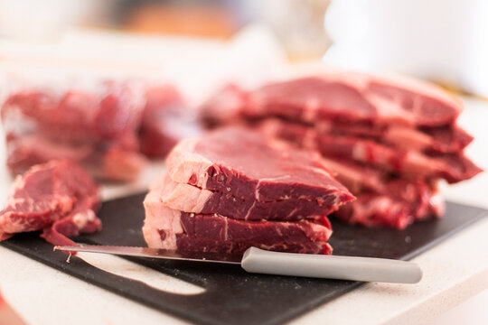 piles of Aussie rump steaks from the butcher