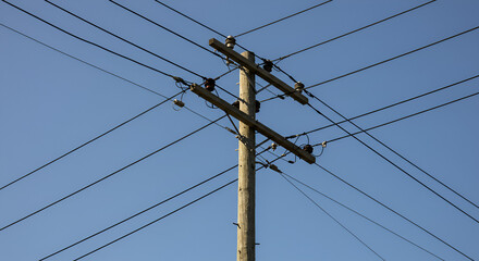 Power lines against a cloudless sky