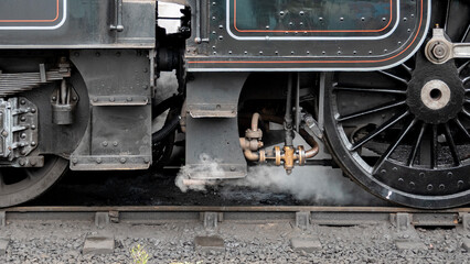 Steam escaping from a valve on a steam locomotive