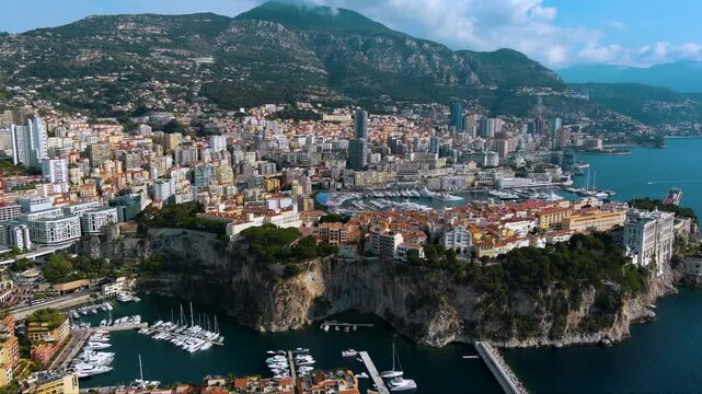 Glamorous drone footage of Monaco&rsquo;s cliff‑hugging Old Town and Oceanographic Museum, super‑yachts in Port Hercule, sleek skyscrapers and the sparkling Mediterranean framed by Alpine foothills.