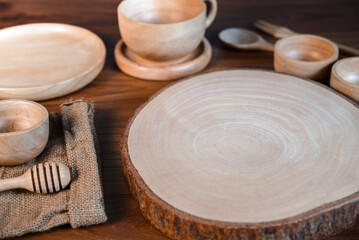 Wooden cutting board and wooden kitchen tools Wooden background.