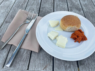 Traditional Italian appetizer with crusty bread topped with melted provola cheese and spicy Calabrian ’nduja