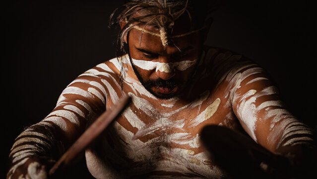 Aboriginal Male looking down
