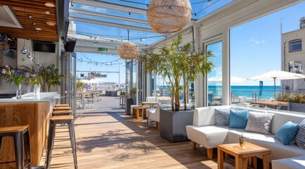 Fototapeta premium Coastal rooftop bar with expansive ocean views.