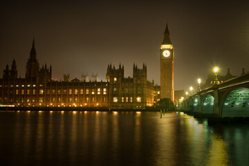 View of Big Ben, Westminster Place and Bridge across the River Thames at night