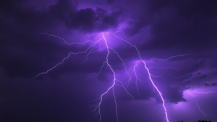 Dramatic purple lightning illuminating a stormy night sky, capturing raw natural energy.