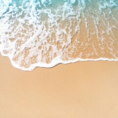 Turquoise Ocean Wave Reaching the Golden Sand Beach on a Sunny Day Aerial View