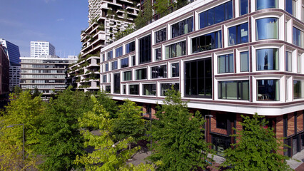 Closeup aerial view of contemporary modern architecture of the Wonderwoods residential real estate housing project. Exterior facade condominium apartment tower