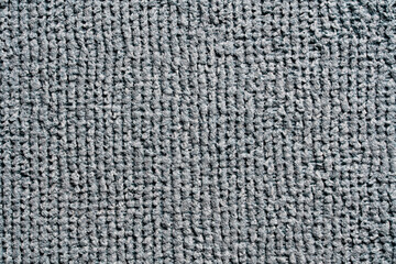 Grey color cleaning rag microfiber cloth background and texture, closeup, top view. Detail sample clean fabric texture backdrop
