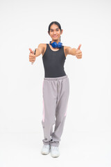 A cheerful Young Asian Transwoman expressing approval with two thumbs up and outstretched arms....