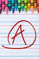 Getting a great grade with A mark on ruled loose leaf notebook paper
