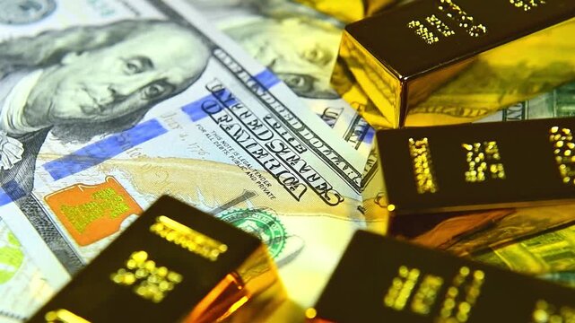 Paper us 100 dollar bill with gold bars, concept of investment and saving, wealth