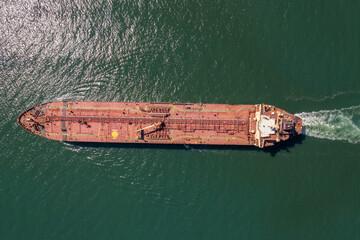 Aerial view of big oil, chemical tanker sails. Tanker ship logistic and transportation business oil...