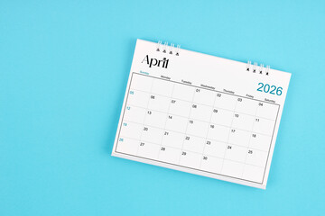 April 2026 Monthly desk calendar for 2026 year on blue color background.