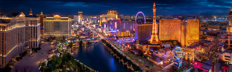 A stunning view of the Las Vegas Strip illuminated at night showcasing vibrant lights and iconic landmarks along the famous boulevard