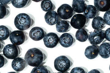 Summer berry background of fresh blueberries in water top view