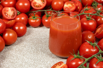Freshly Squeezed Tomato Juice and Ripe Tomatoes.