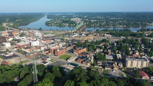 Expansive aerial view showcases Parkersburg, West Virginia, featuring the downtown area, the Ohio River, and the Little Kanawha River on a clear day.