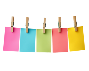 Colorful notes hanging with wooden clothespins