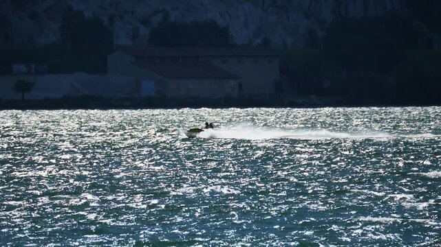 Speedboat in Lecco lake, Lombardy, Italy
