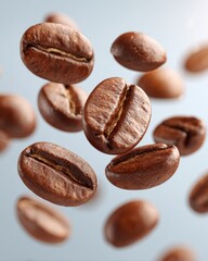 Fototapeta premium Golden roasted coffee beans are prominently displayed, highlighting their rich texture and warm hues. This close-up view celebrates their quality and freshness, ideal for coffee lovers