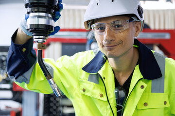 automation machine engineer students study and inspection control robot arm machine in robotics engineering academy at university or factory workshop. AI robot technology, repairing, working.
