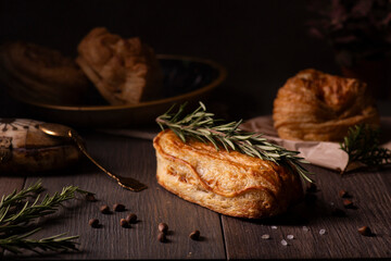 A selection of pastries arranged on a rustic wooden surface