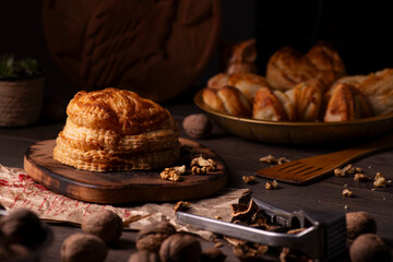 A selection of pastries arranged on a rustic wooden surface