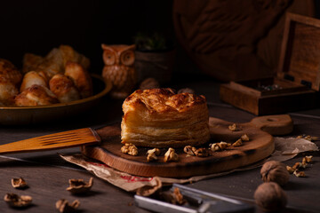 A selection of pastries arranged on a rustic wooden surface