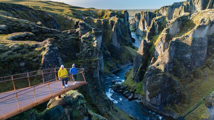 Explore the dramatic landscapes of Fjadrargljufur Canyon in Iceland during a sunny afternoon