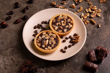 Delicious composition with two chocolate tarts