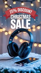 Discounted headphones and smartphone on a festive table with Christmas lights during a winter sale event