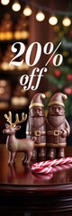 Holiday display featuring chocolate Santa figures with reindeer and candy canes in festive setting