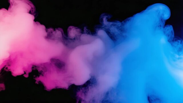 Pink and blue clouds of smoke colliding and mixing on a black background