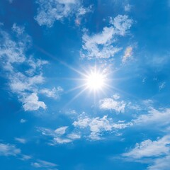 Bright sun shining in a beautiful blue sky filled with fluffy clouds. A perfect summer day filled with sunshine
