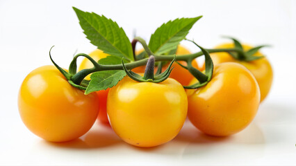 Cluster of ripe yellow tomatoes with attached green leaves isolated on a white background. Suitable for food blogs, healthy eating concepts, and fresh produce advertisements.
