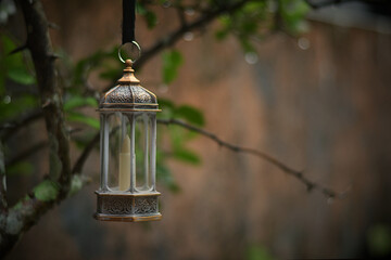 Islamic lanterns isolated on a dark background, the concept of Ramadan, Eid al-Fitr, and other Islamic holidays. Stunning Ramadan candle lanterns with free space
