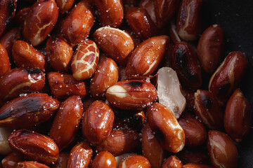 Beautifully roasted oily red skin peanut with natural light                              