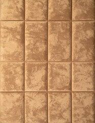 Beige Textured Acoustic Wall Panels in Square Tile Pattern Background